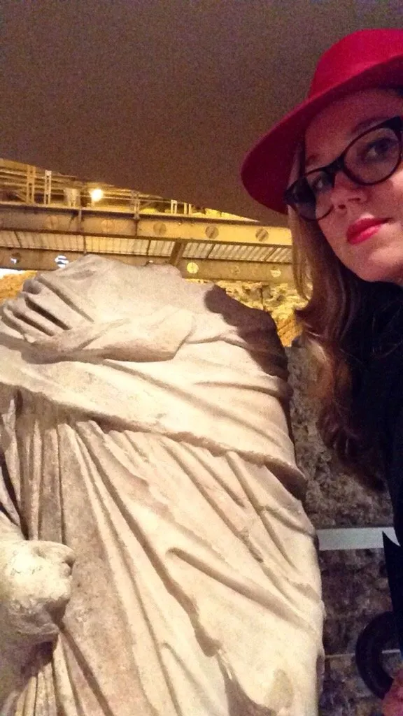 Alone with an ancient statue